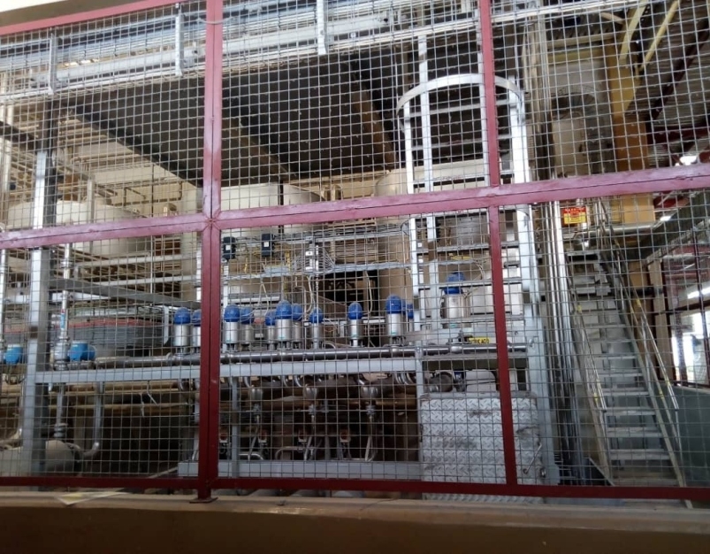 Industrial tank interior and scaffolding setup