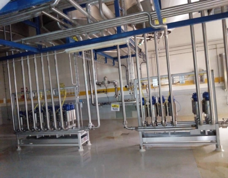 Overhead cable management tray and utility routing