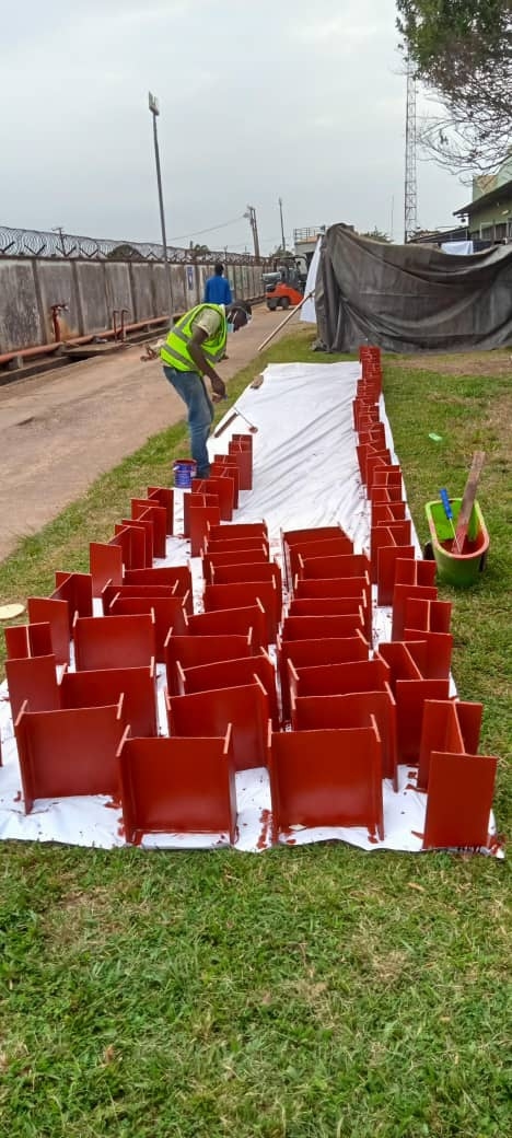 Row of red outdoor safety line barrier fixtures