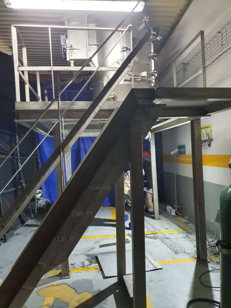 Multi-level metal storage platform catwalk setup