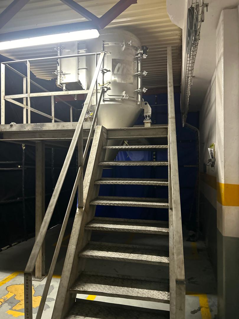 Stair access tower leading up to storage reservoir platform